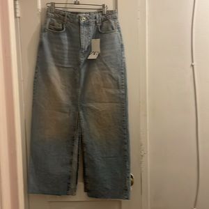 High waist denim skirt with double slit  with 5 pockets sz s .